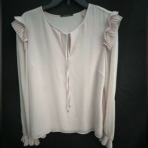 T Tahari size Xtra-large  top with pleated  details on shoulders and sleeves